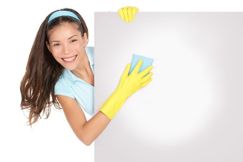 Protective gloves and safety gear used during carpet cleaning work
